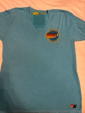 Aviator Nation Light Blue V-Neck Tee with Rainbow Patch